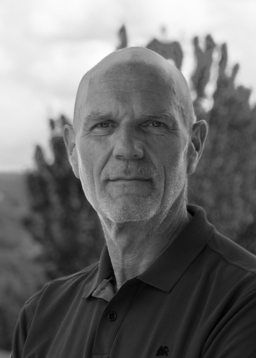Guido Bosbach, portrait in black and white, taken outdoors.